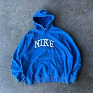 Vintage Nike Athletic Dept Blue Spell Out Hoodie XXL
(Fits like XL)
